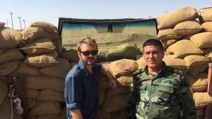 Former Liberal National Party MP Wyatt Wyatt Roy with a member of the Peshmerga in Sinjar area.