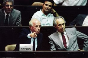 Yitzhak Rabin (L), sitting next to Shimon Peres in the Knesset in 1992.