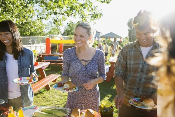 Backyard barbeques are perfect for fostering a bit of hygge. Photo: Getty