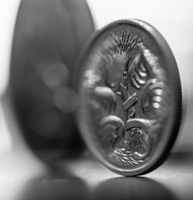 Not only can retailers flat out refuse cash, but pay with too many small coins and you might be offering 'illegal tender'. Photo: Getty