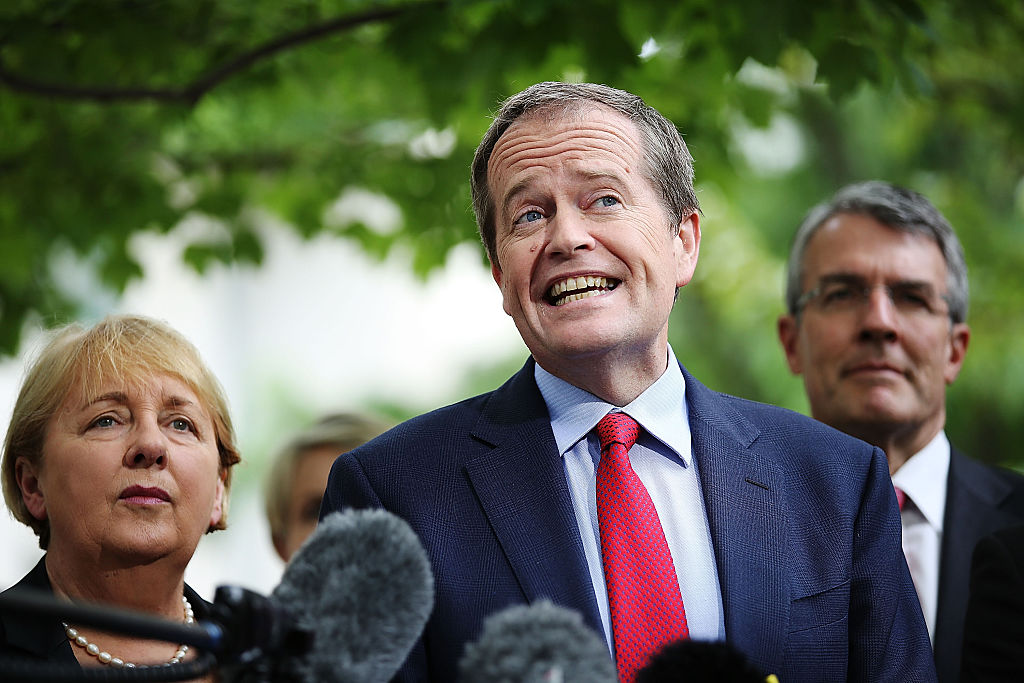 CANBERRA, AUSTRALIA - DECEMBER 04: Opposition leader Bill Shorten and his colleagues speak to the media during a press conference to reflect on 'Tony Abbott's Year of Broken Promises' at Parliament House on December 4, 2014 in Canberra, Australia. Today is the official last day of sitting at Parliament for 2014. Parliament will return on February 9, 2015. (Photo by Stefan Postles/Getty Images)