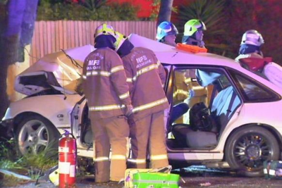 Two passengers trapped in the car had to be freed by emergency services.
