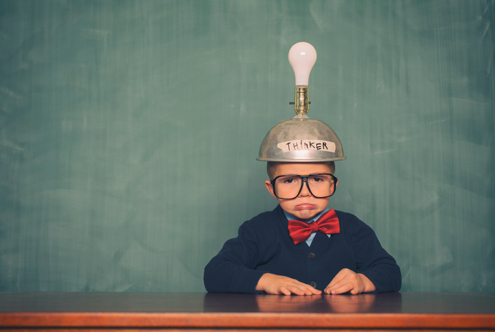 A young boy and nerd just can't think of anything new and hip.