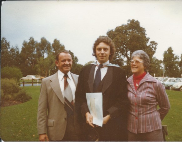 Carney and his parents at his graduation.