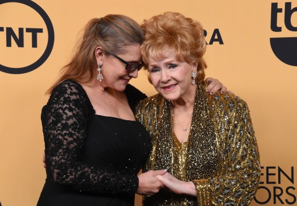 Carrie Fisher and Debbie Reynolds at the 2015 SAG Awards, where Reynolds was honoured. Photo: Getty