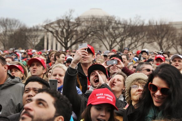 Supporters on the National Mall cheered President Donald J. Trump. Photo: Todd Heisler/The New York Times