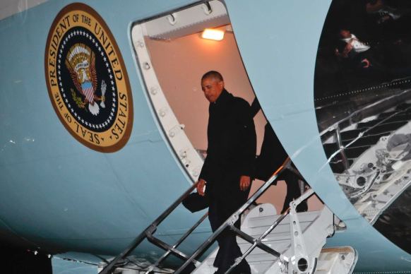 Barack Obama steps off Air Force One