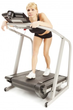 Happy woman on treadmill