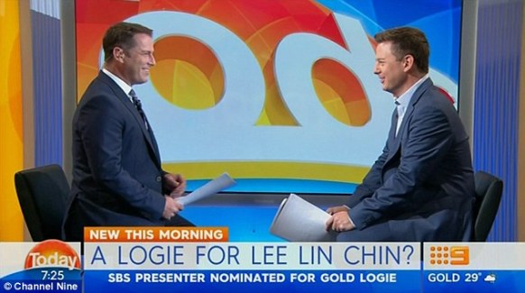 Karl Stefanovic (left) and Ben Fordham happily face off wearing similar suits.