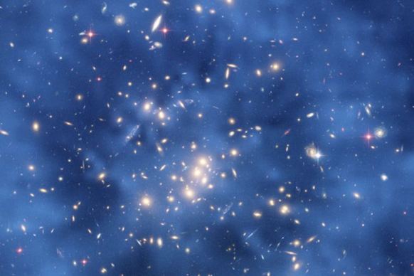 An image from Hubble Space Telescope shows ring of dark matter in a galaxy cluster.