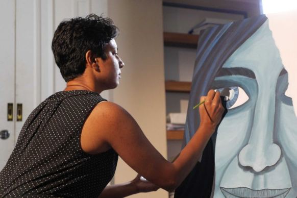 Chamari Liyanage painting a picture