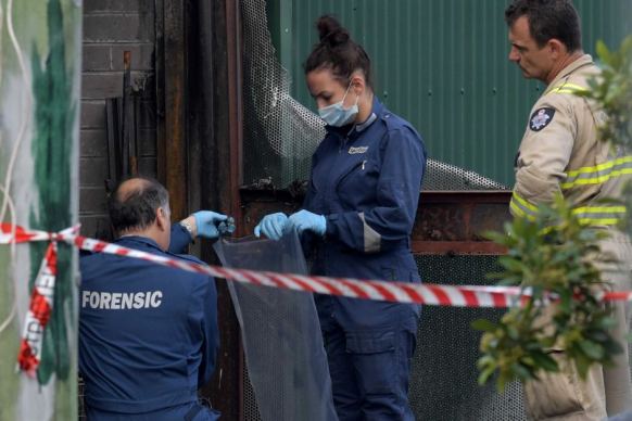 Forensic officers at Footscray factory fire