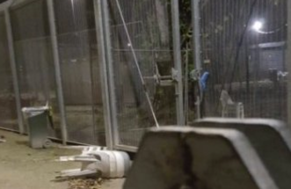 Detainees said the Manus Island detention centre gate was reportedly damaged by PNG Defence Force personnel. PHOTO: Supplied
