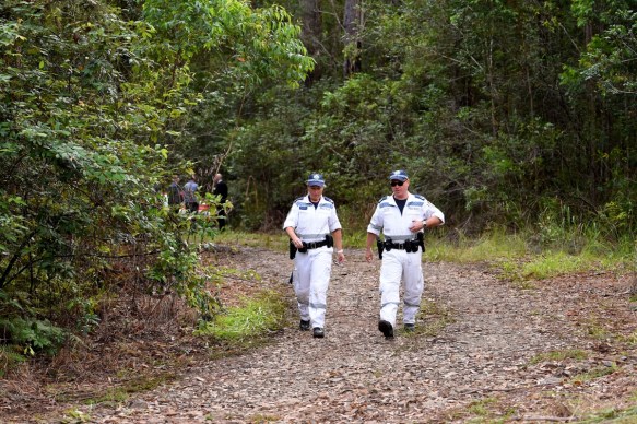 Police search dense bushland for evidence of the missing boy in March, 2015.