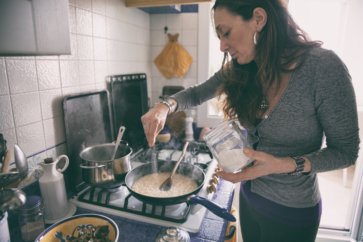 Mature woman cooking