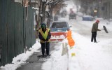 A man shovels the snow, New York, USA