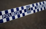 Police tape at the scene of a crime