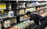 File photo of a man checking prices in a supermarket