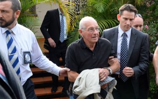Rogerson faced a wall of cameras outside his home.
