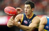 Tex Walker booted five goals for the Crows.