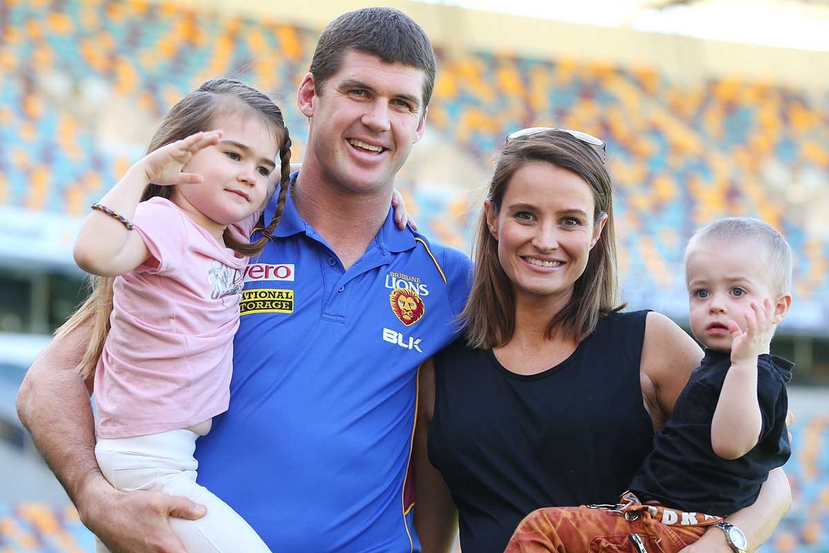 Jonathan Brown on Monday with wife Kylie and children Olivia and Jack.