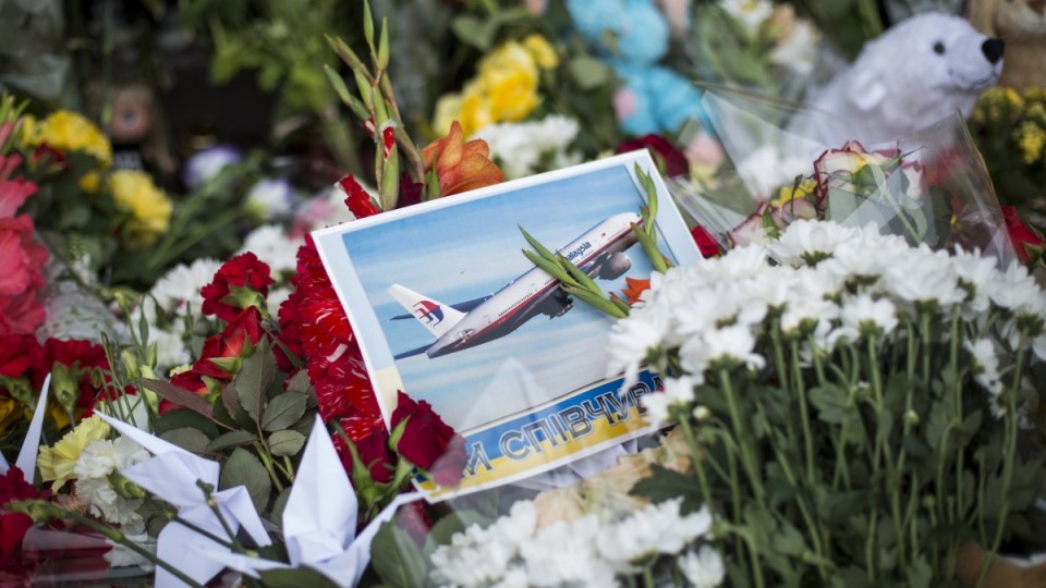 Tributes in front of the Netherlands Embassy in memory of the victims of flight MH17. Getty