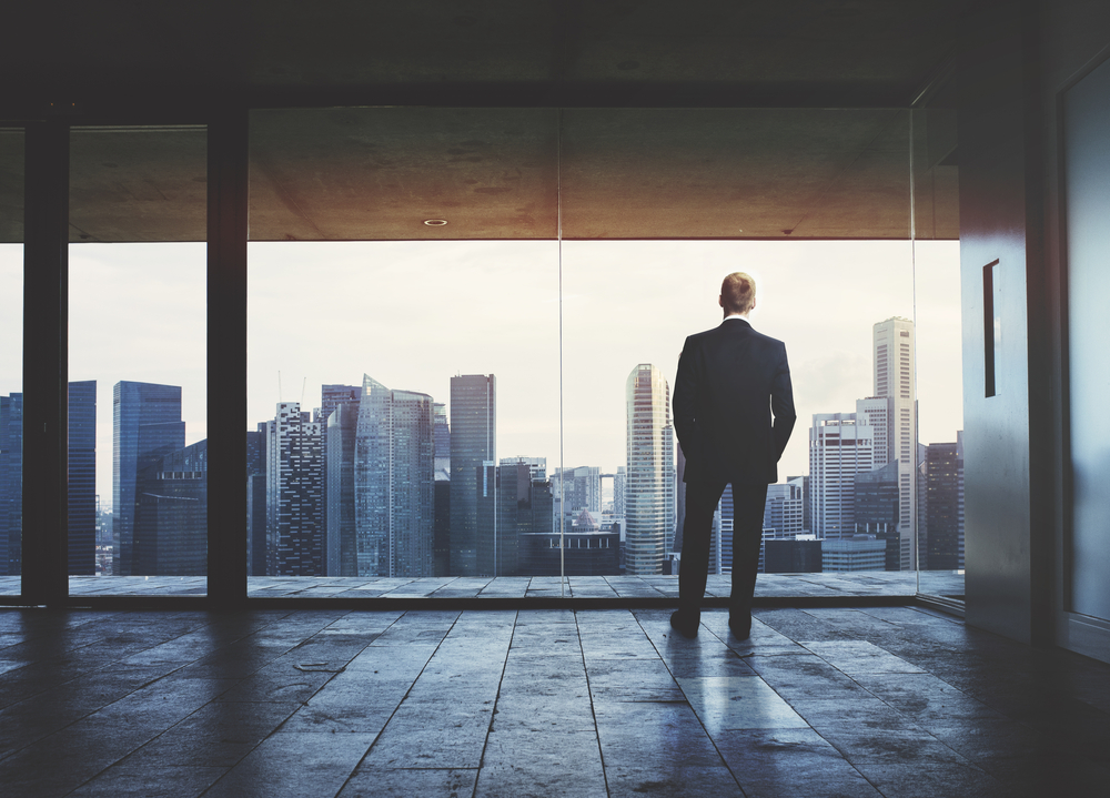Business man in window