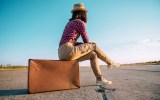 Travel suitcase woman road