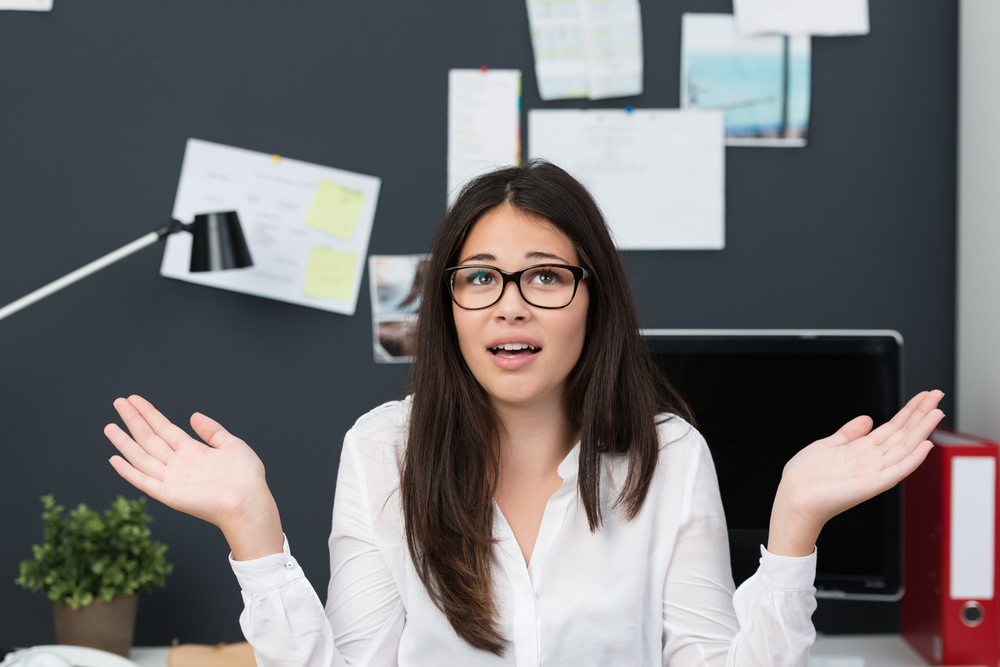 super woman at office confused