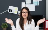 super woman at office confused