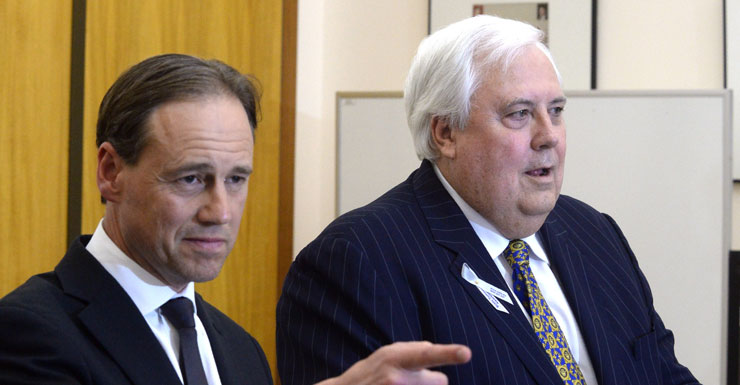 Greg Hunt (L) and Clive Palmer
