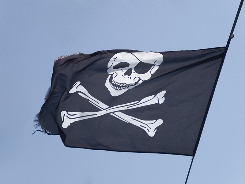 Jolly Roger. Pirates. Piracy. Shutterstock