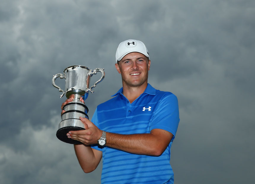 Jordan Spieth poses with the Stonehaven trophy.