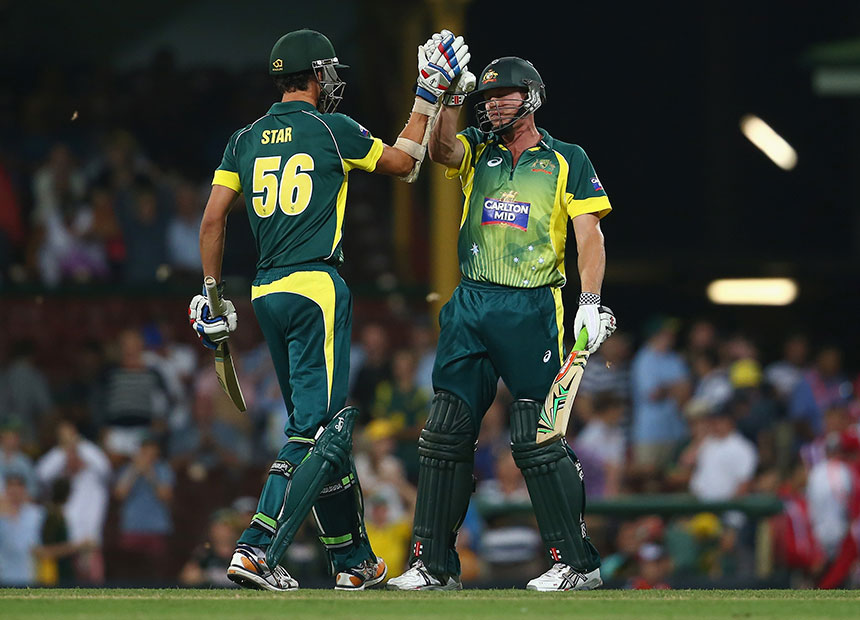 Mitchell Starc congratulates James Faulkner