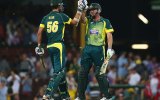 Mitchell Starc congratulates James Faulkner