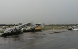 Destructive winds flipped planes at Archerfield airport.