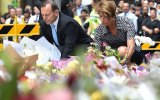 Tony Abbott and his wife Margaret lay wreaths at a makeshift memorial in Martin Place.