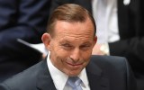 Tony Abbott smirk grin. AAP
