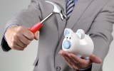 Piggy bank with hammer