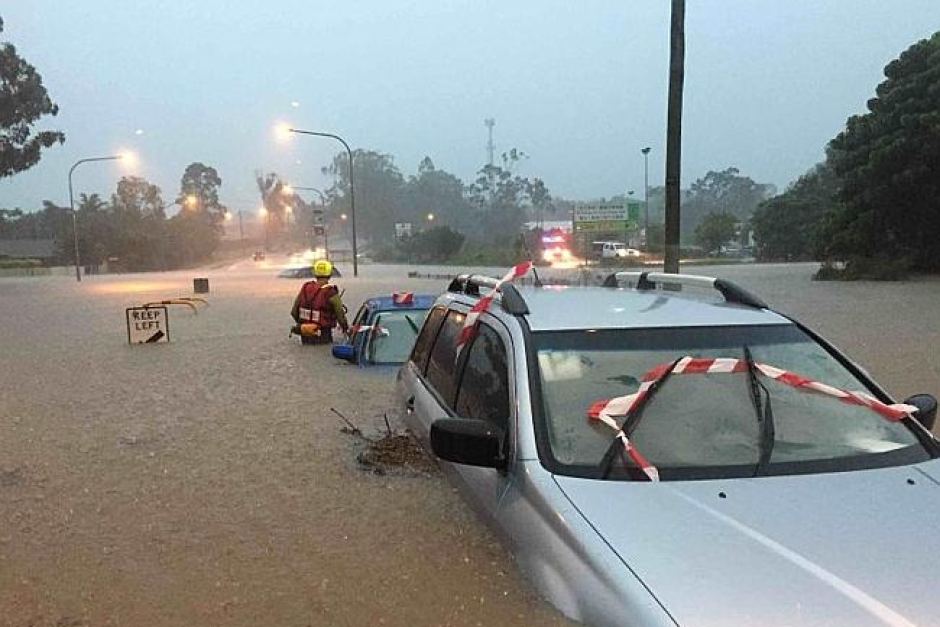 Swift water rescue teams checking cars in Brisbane.