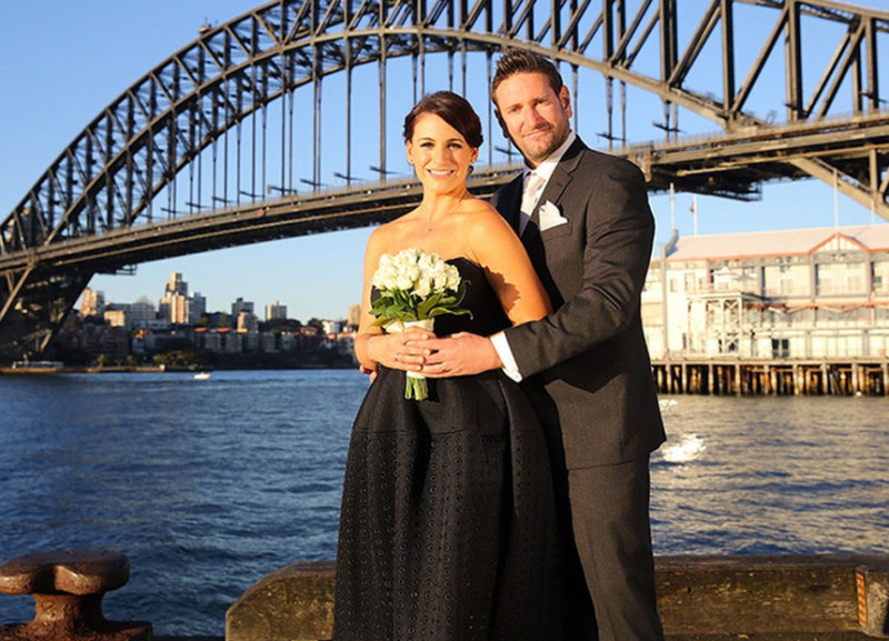 Clare and Lachlan celebrate their TV marriage under the Sydney Harbour Bridge.