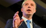Immigration Minister Peter Dutton has backtracked on initial denials that people smugglers were paid to turn their boat around.