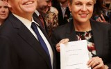 Mr Shorten and Ms Plibersek pose with the same-sex marriage bill.
