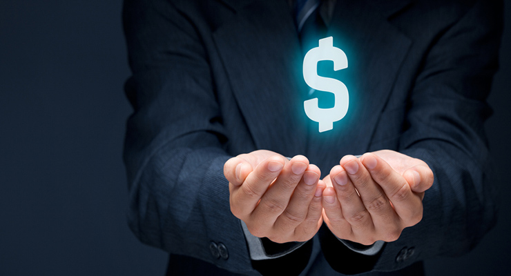 Businessman in suit with money symbol