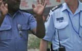 Australian Federal Police work alongside the Papua New Guinea Royal Constabulary