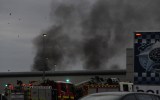 Smoke rising from the prison where inmates were rioting over a smoking ban.