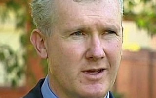 Tony Burke says it is a "justifiable expectation" his children should not have flown business class.