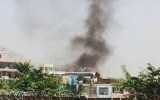 Smoke can be seen after an explosion at the Kabul airport.