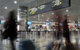 Passengers face long queues.