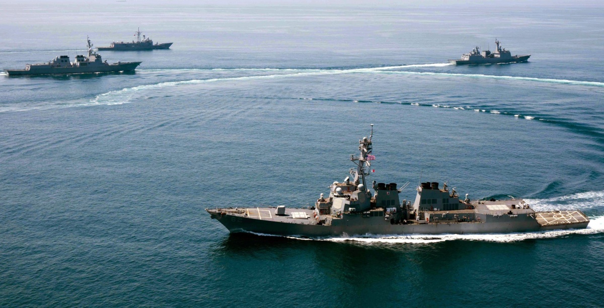 A Navy destroyer nears contested territory in the South China Sea.